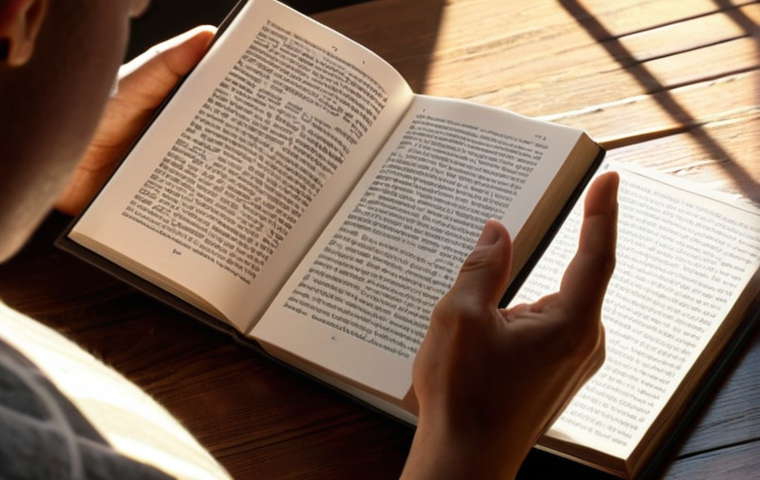 A person reading a physical book in a sunlit room, phone turned off nearby, promoting a break from digital devices.